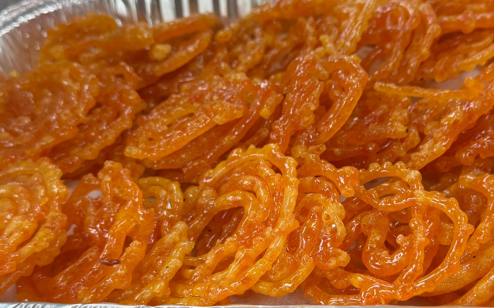 Freshly made jalebi in syrup